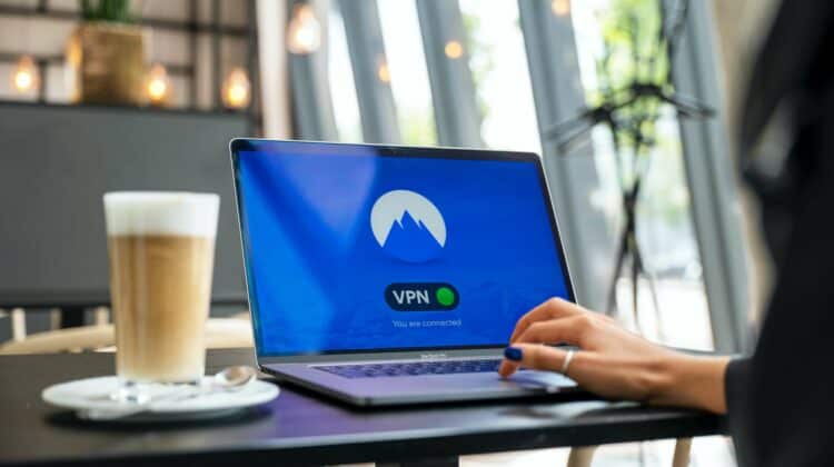 laptop on a table with the sign vpn connected