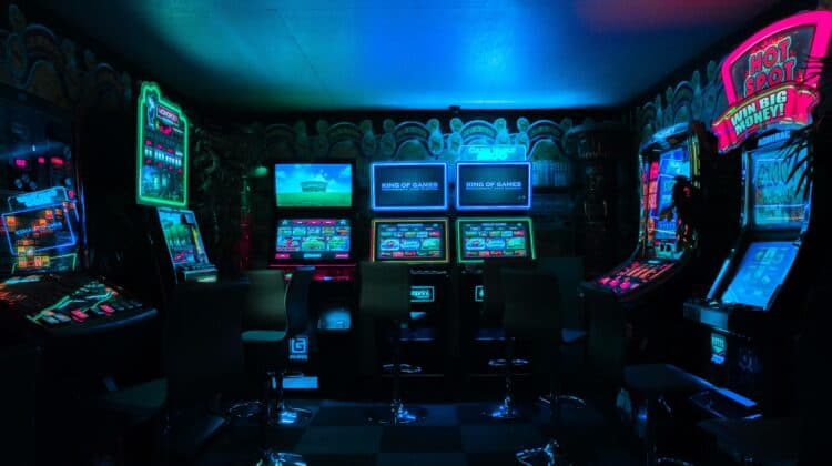 Arcade games in a dark room.