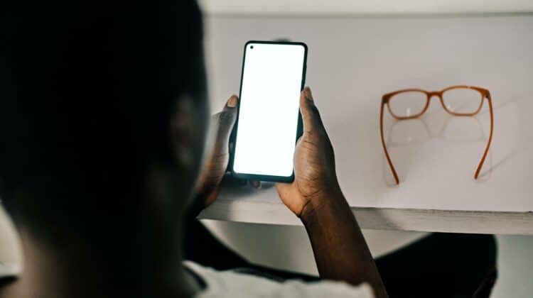 person holding white android smartphone