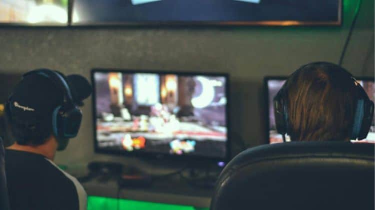 men with headphones with digital entertainment