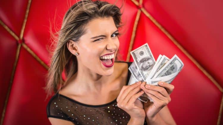 woman winning money casino online